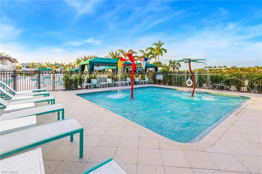 21065 Teak Tree Terrace Estero, FL 33928 - Photo 12 of 15 a view of a park with swings