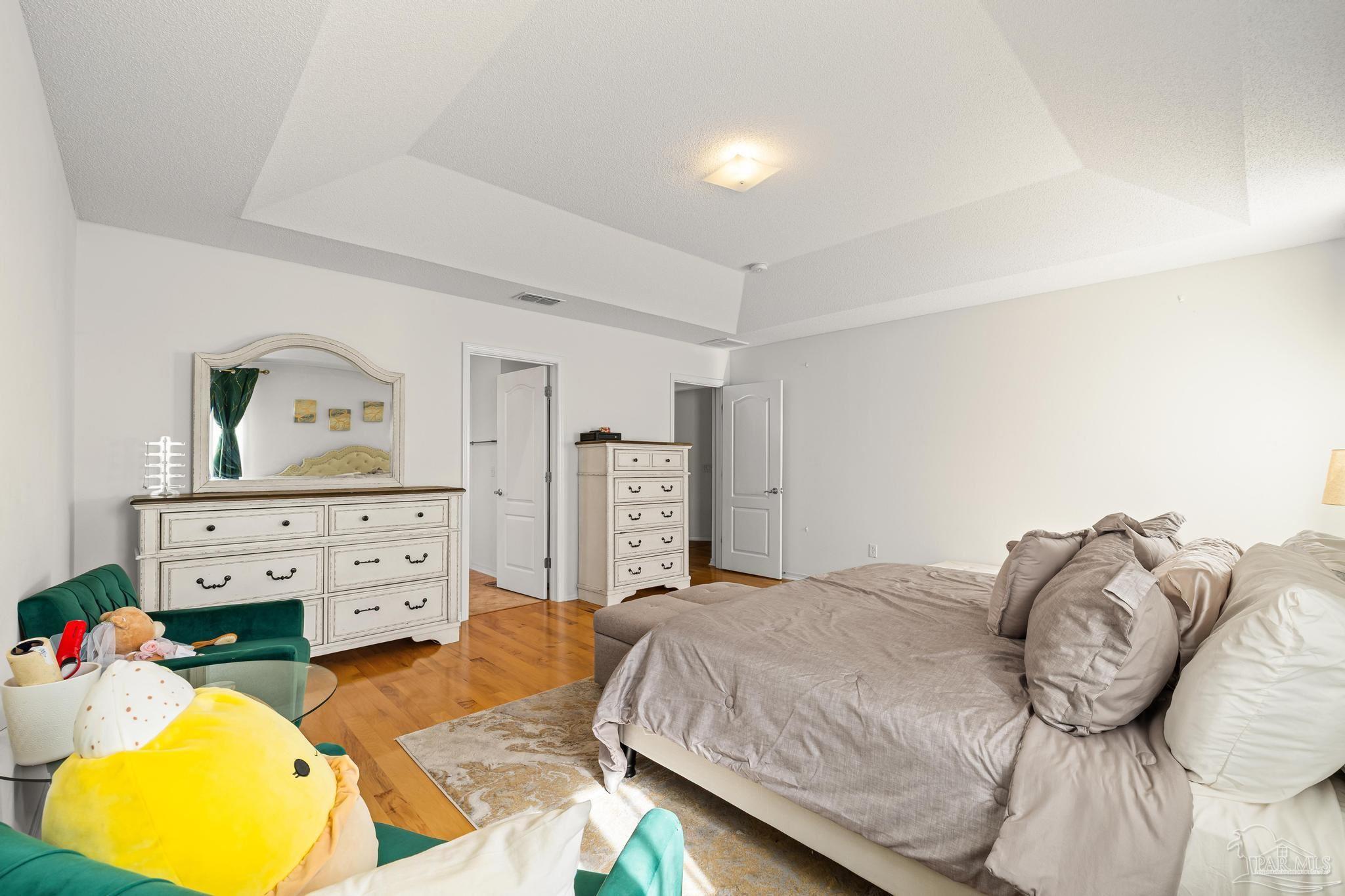 2165 Liberty Loop Road Cantonment, FL 32533 - Photo 37 of 51 a bedroom with a bed and dresser