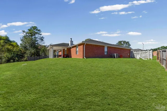a house view with garden space