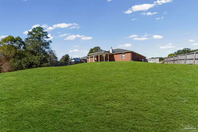 a house view with a garden space
