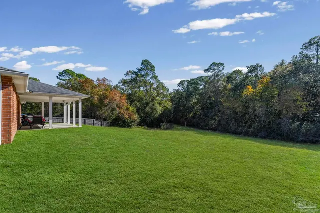 a picture of a bathroom with a window