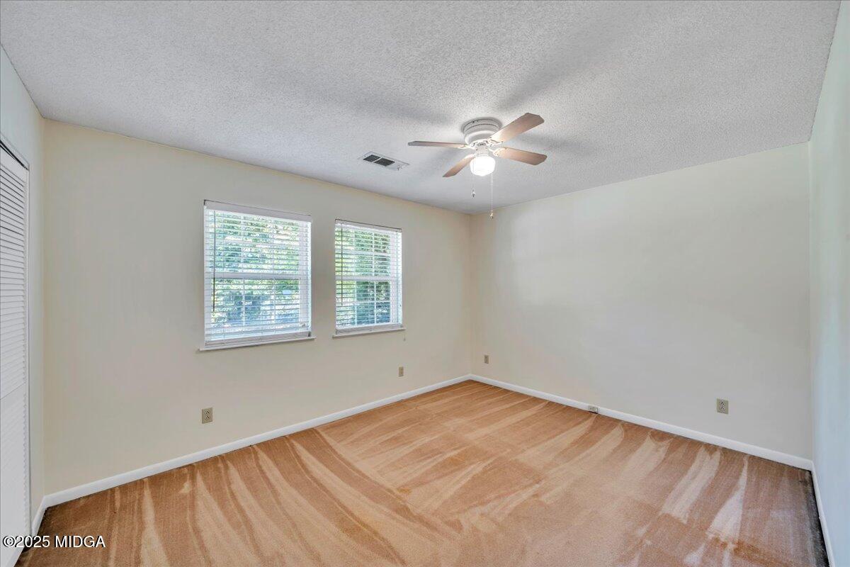41 Golden Eye Monticello, GA 31064 - Photo 25 of 65 wooden floor in an empty room with a window