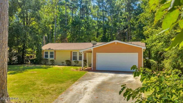 a view of swimming pool with chairs