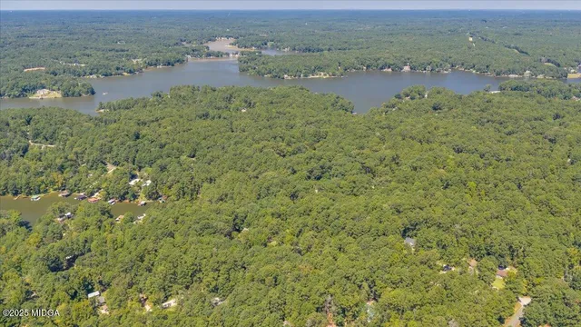 a view of a lake with outdoor space