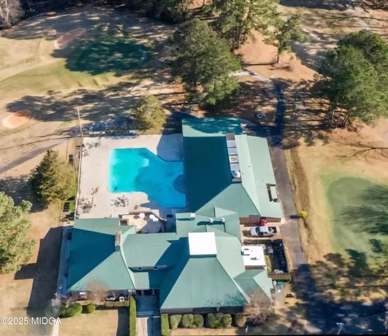 a view of an ocean beach and mountain