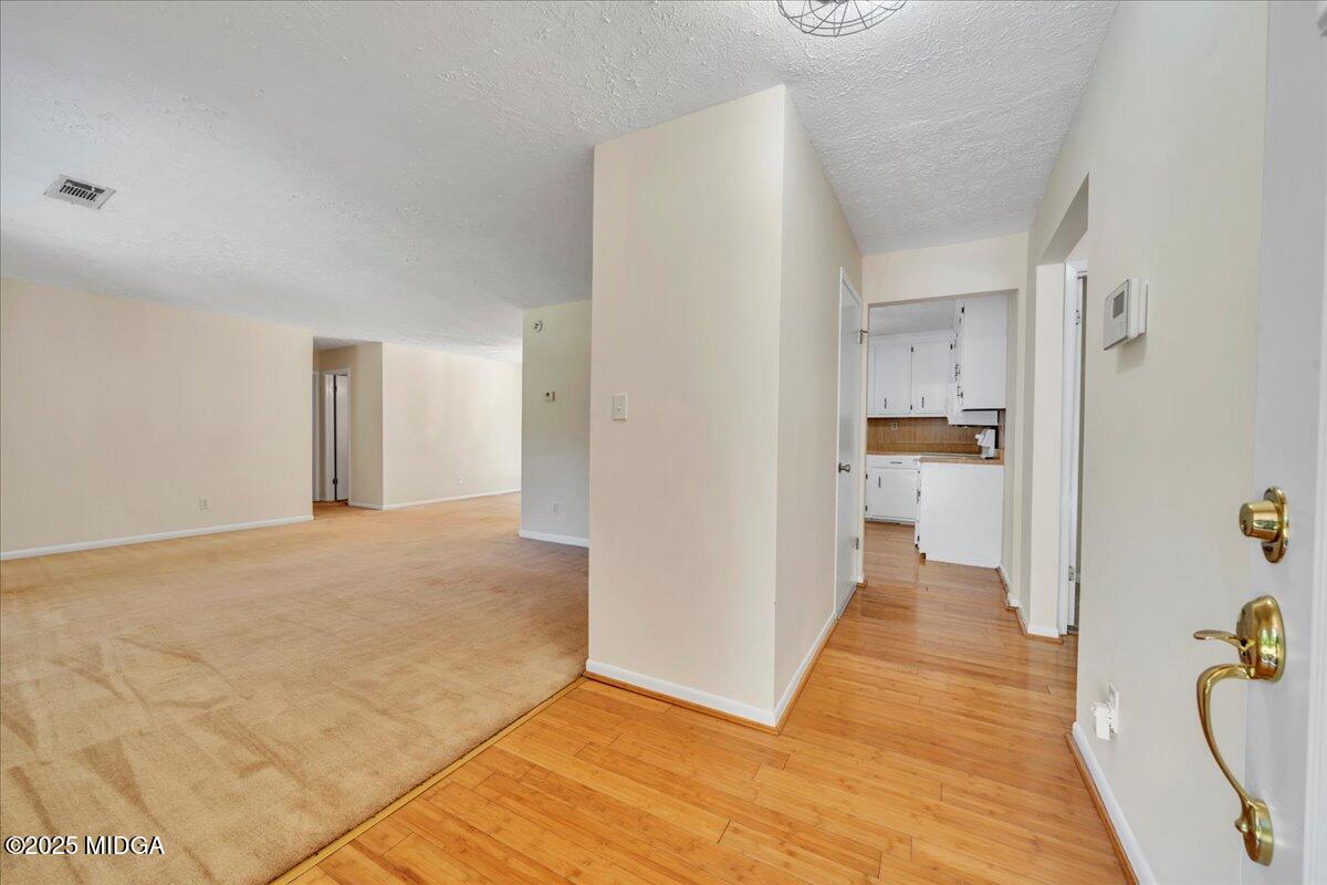 41 Golden Eye Monticello, GA 31064 - Photo 9 of 65 a view of a kitchen cabinets and wooden floor