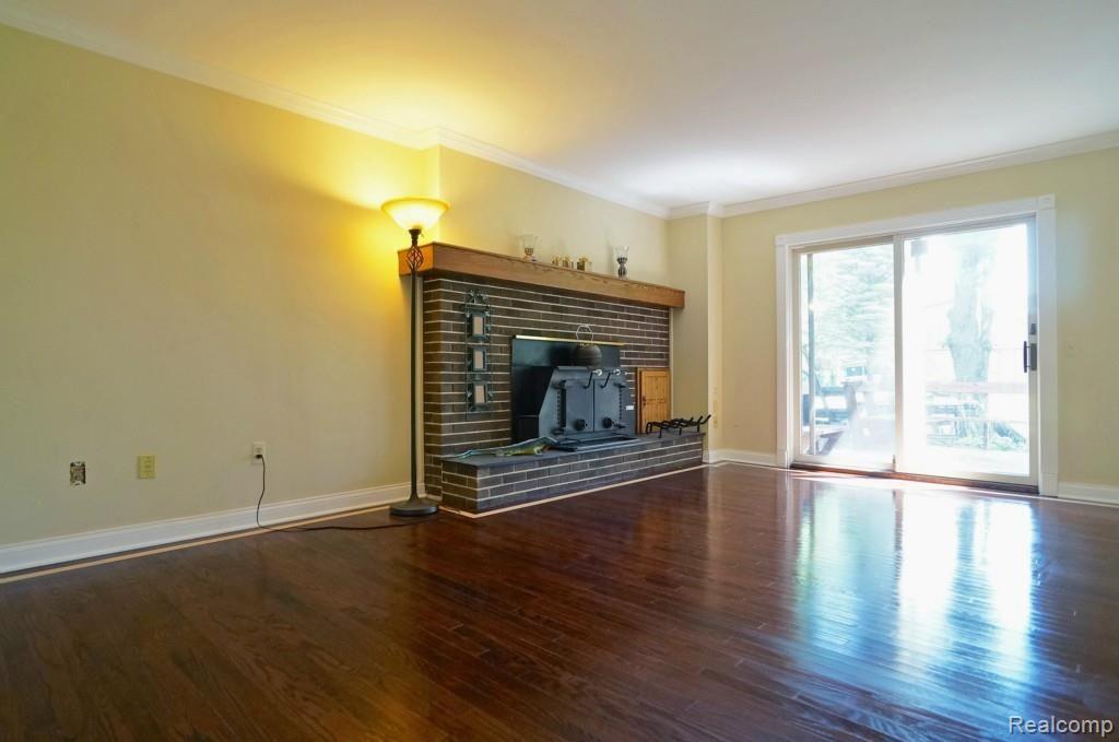 900 East Dawson Road Milford, MI 48381 - Photo 7 of 20 Fireplace in Family Room
