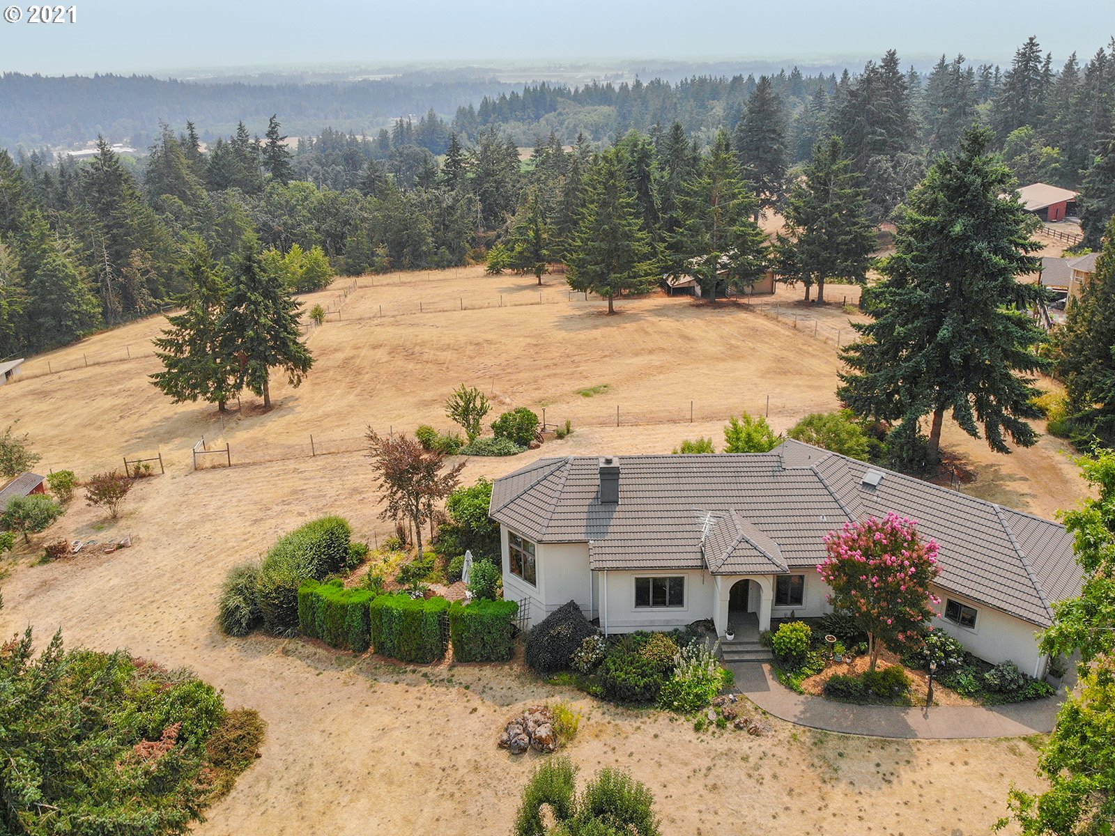 18350 Southwest Kramien Road Newberg, OR 97132 - Photo 1 of 31 a view of a house with a yard and mountain
