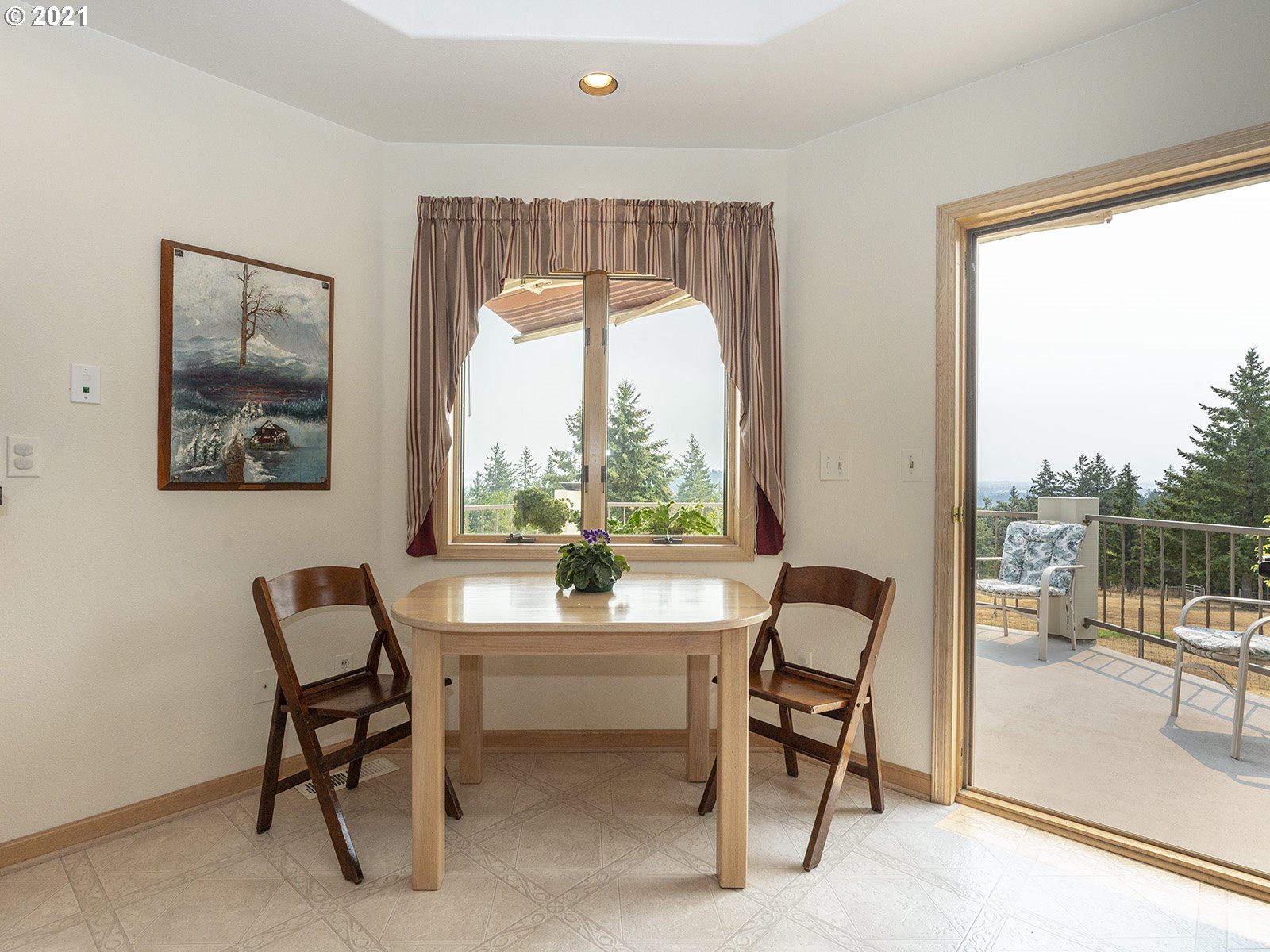 18350 Southwest Kramien Road Newberg, OR 97132 - Photo 11 of 31 a dining room with furniture and a floor to ceiling window