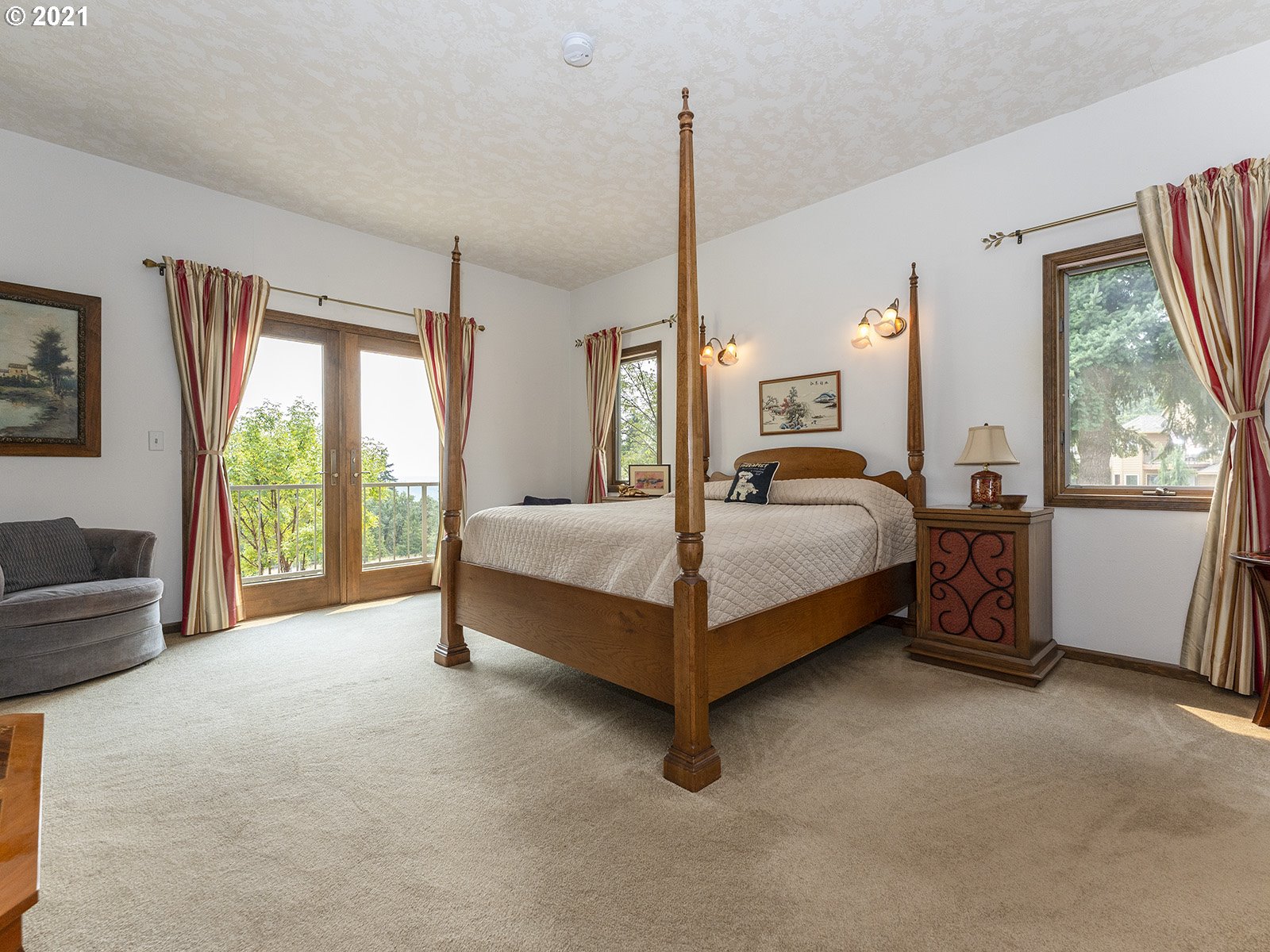 18350 Southwest Kramien Road Newberg, OR 97132 - Photo 12 of 31 a bedroom with a bed lamp and window