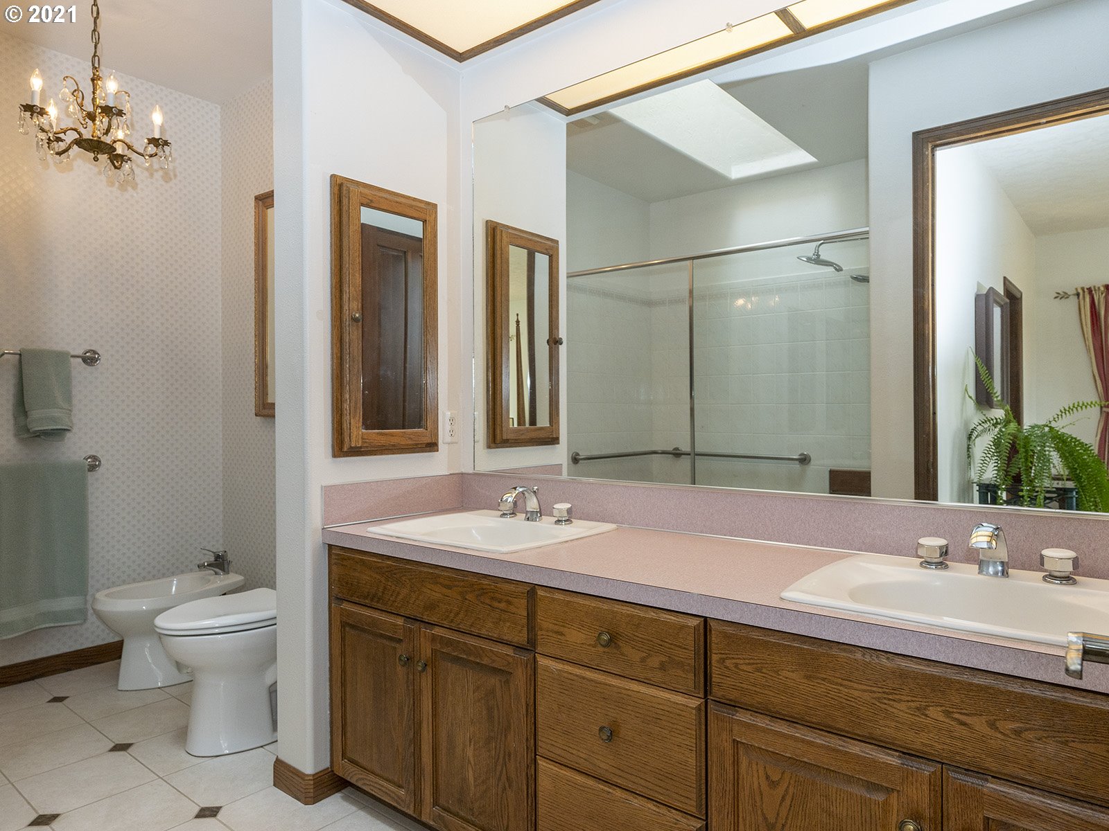 18350 Southwest Kramien Road Newberg, OR 97132 - Photo 15 of 31 a bathroom with a granite countertop sink a toilet and a mirror