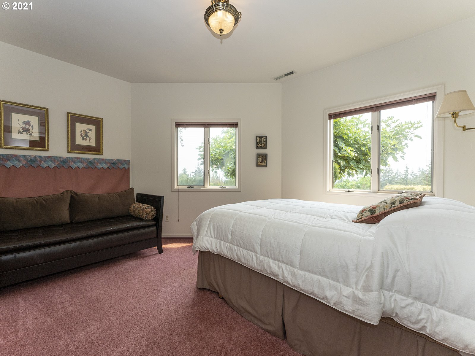 18350 Southwest Kramien Road Newberg, OR 97132 - Photo 19 of 31 a bedroom with a bed lamp and window