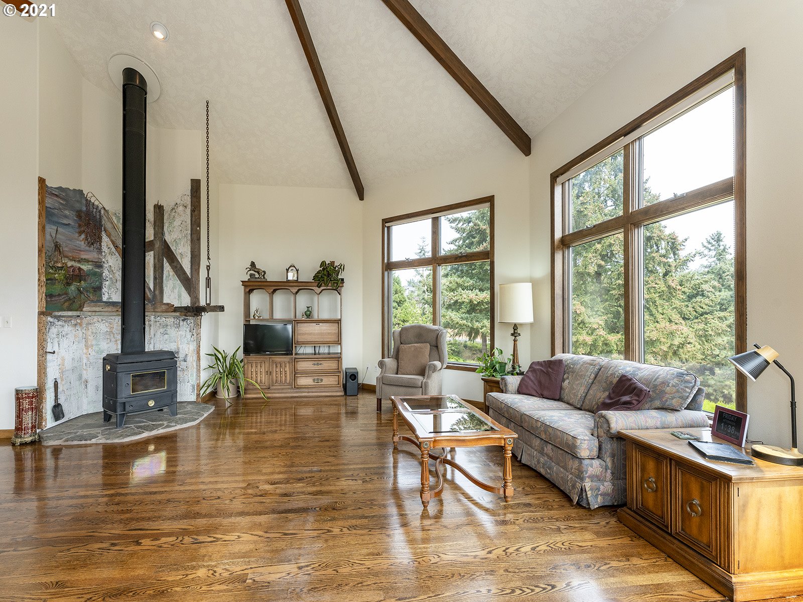 18350 Southwest Kramien Road Newberg, OR 97132 - Photo 3 of 31 a living room with furniture and floor to ceiling windows