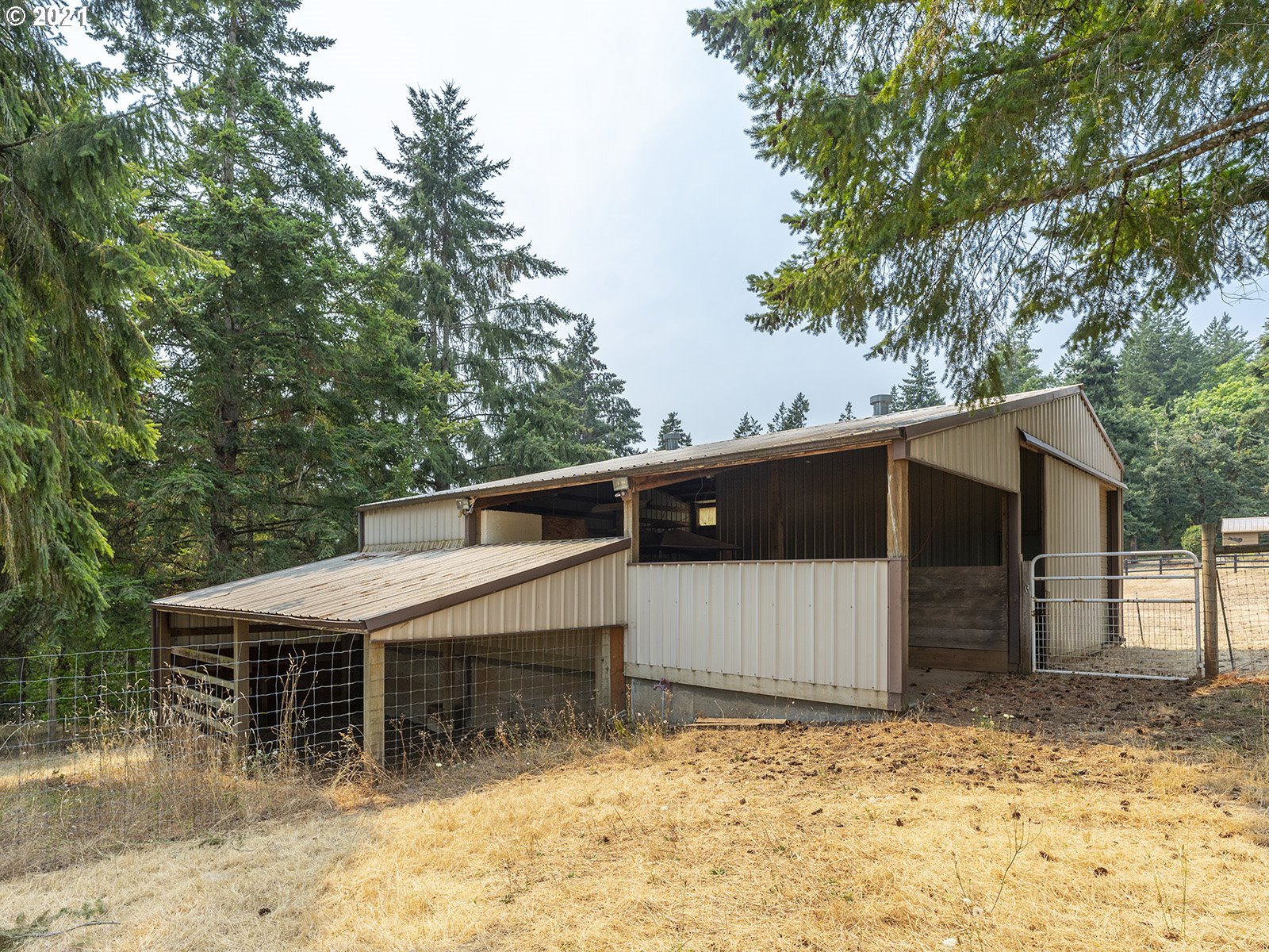18350 Southwest Kramien Road Newberg, OR 97132 - Photo 27 of 31 a front view of a house with a yard and garage