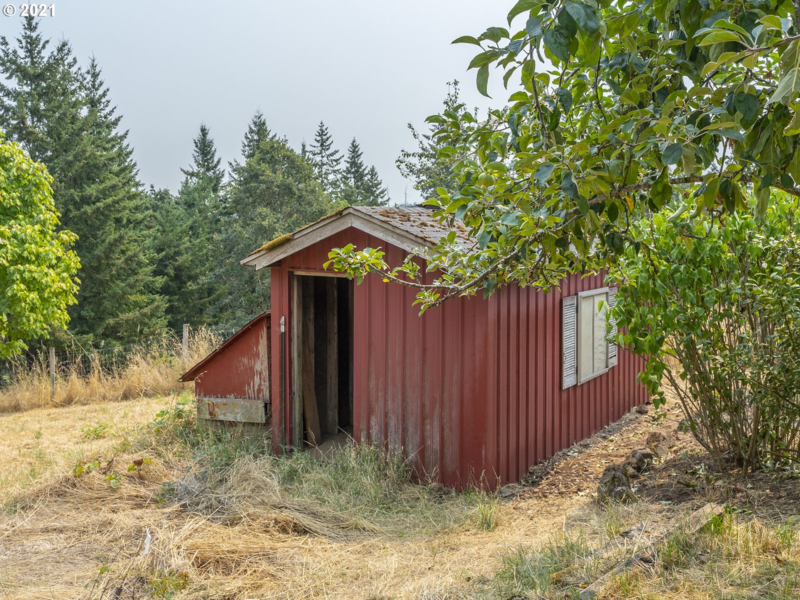 18350 Southwest Kramien Road Newberg, OR 97132 - Photo 28 of 31 a wooden fence with a trees in the background
