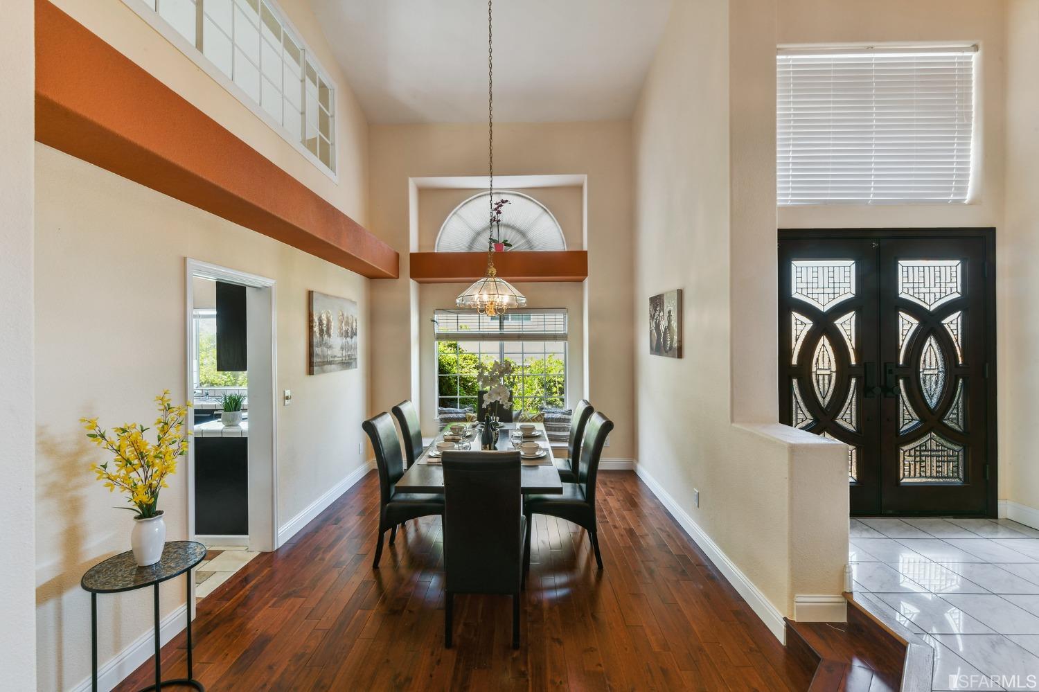 698 Turquoise Drive Hercules, CA 94547 - Photo 12 of 50 a view of a dining room with furniture window and wooden floor
