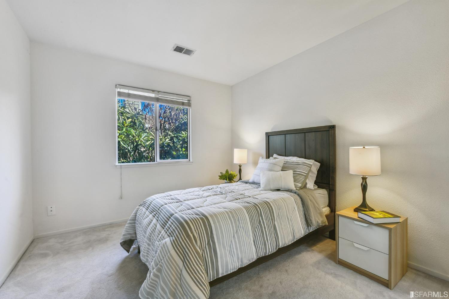 698 Turquoise Drive Hercules, CA 94547 - Photo 34 of 50 a bedroom with a bed and window