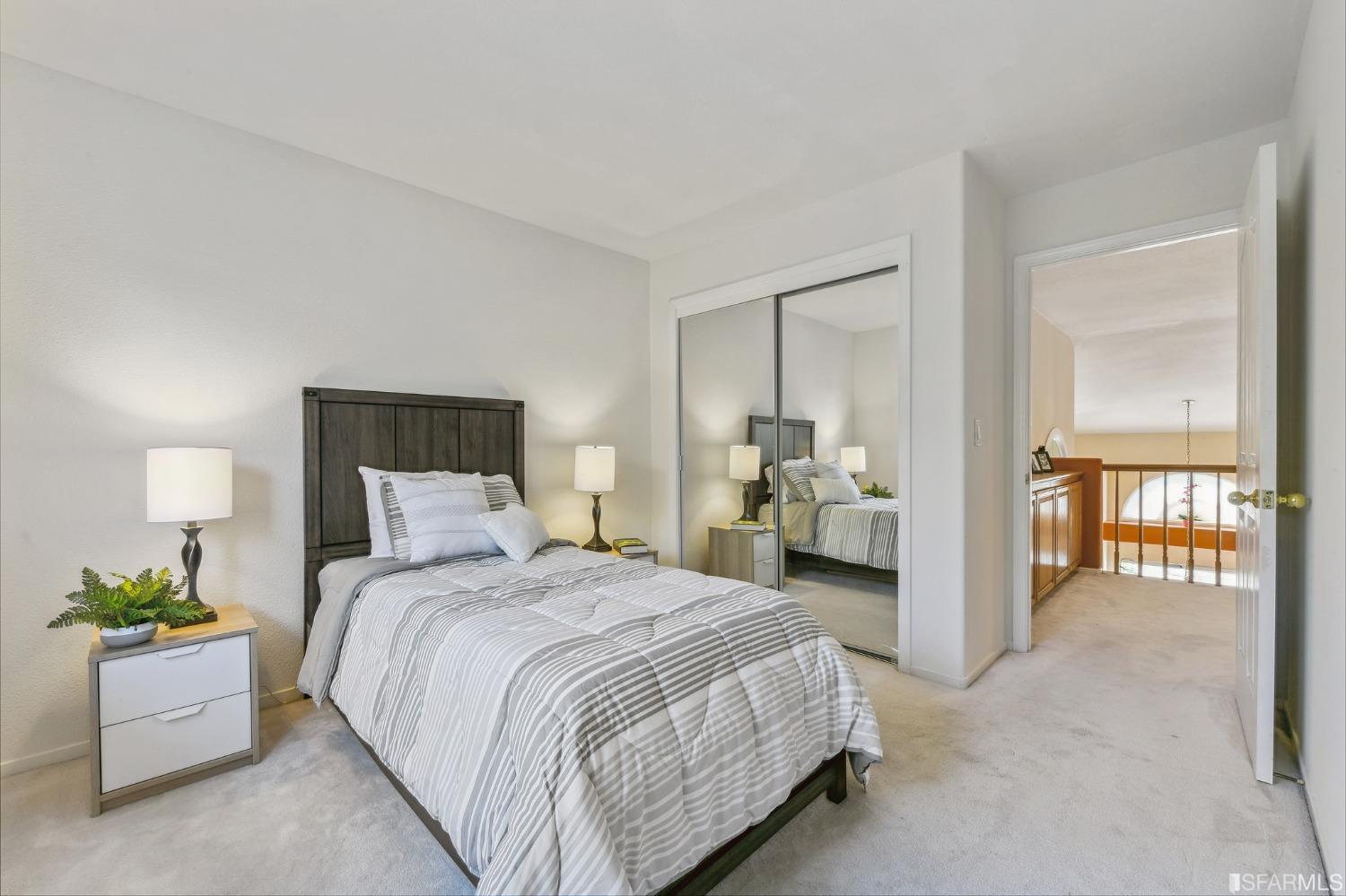 698 Turquoise Drive Hercules, CA 94547 - Photo 35 of 50 a bedroom with a bed and a view of en suite bathroom