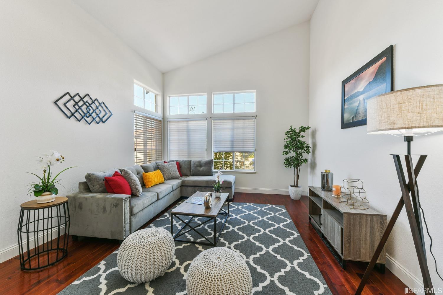 698 Turquoise Drive Hercules, CA 94547 - Photo 6 of 50 a living room with furniture and wooden floor