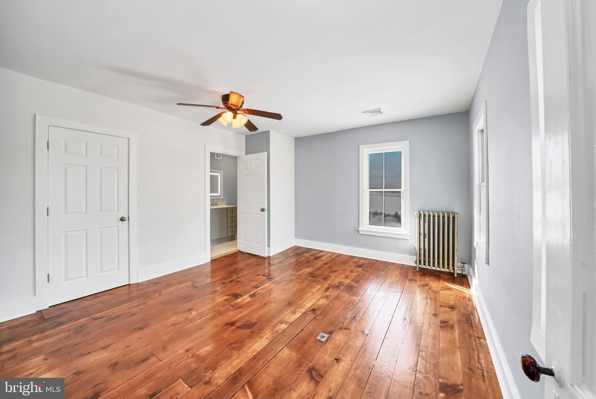 89 Asbury Broadway Road Asbury, NJ 08802 - Photo 14 of 49 a bedroom with a bed and a window