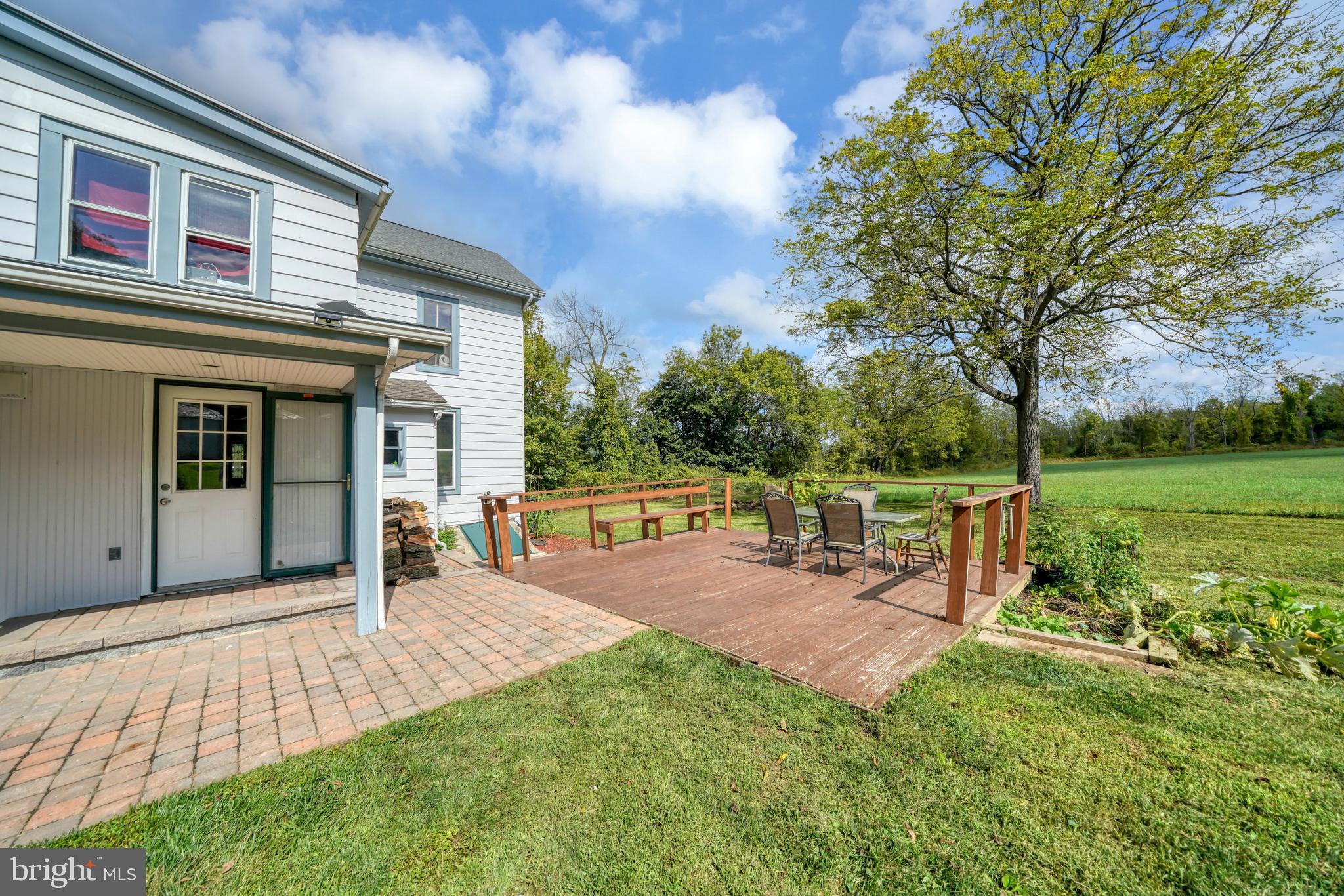 89 Asbury Broadway Road Asbury, NJ 08802 - Photo 2 of 49 a view of a house with backyard porch and sitting area