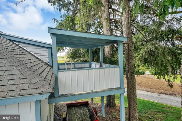 a side view of a small yard from a balcony