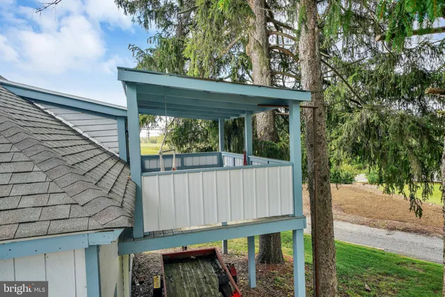 a side view of a small yard from a balcony