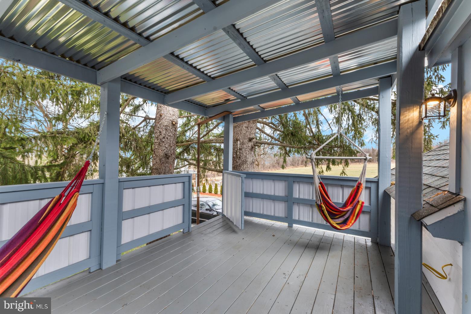 89 Asbury Broadway Road Asbury, NJ 08802 - Photo 34 of 49 a bench sitting in front of a building