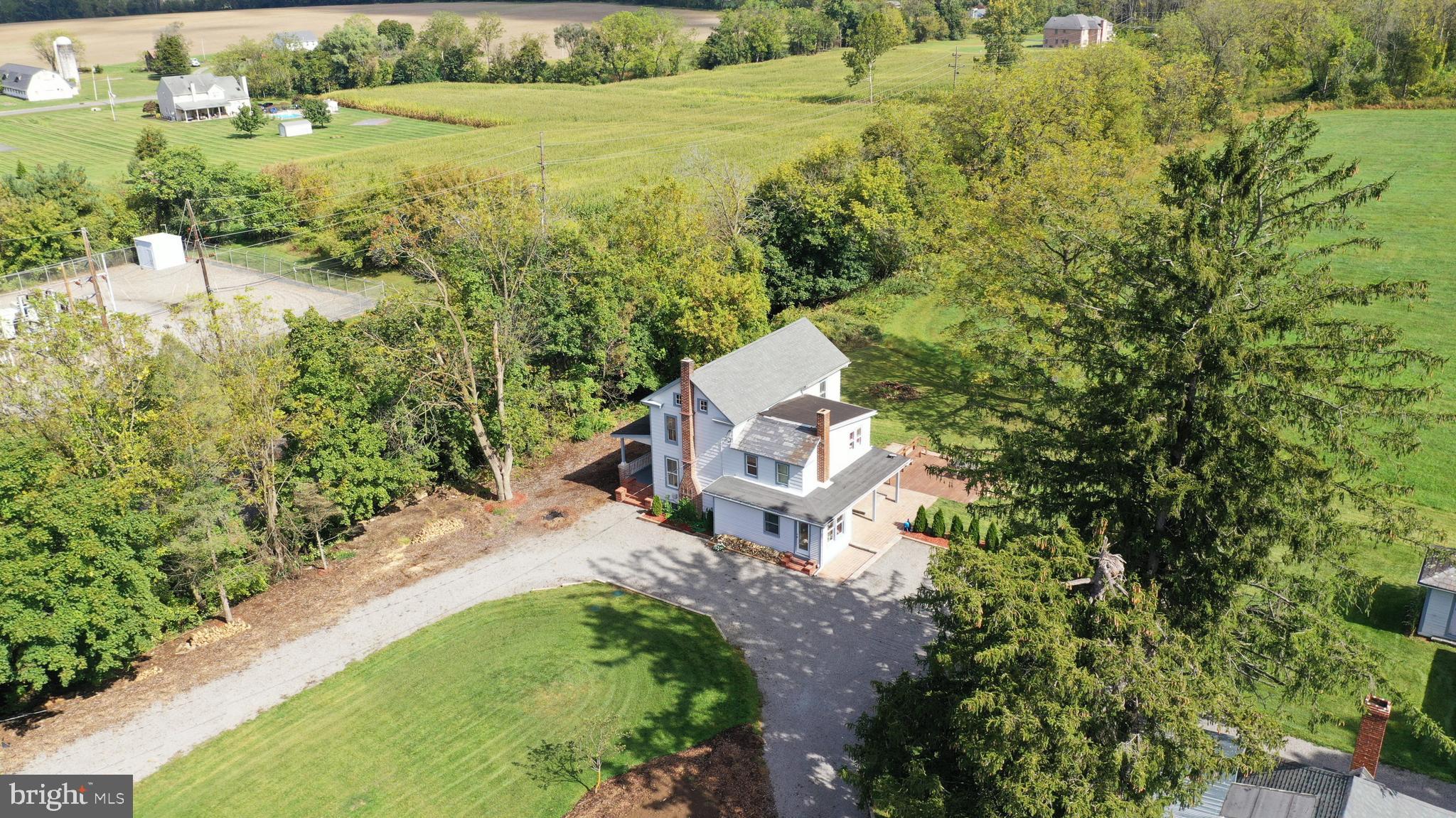 89 Asbury Broadway Road Asbury, NJ 08802 - Photo 46 of 49 an aerial view of residential house with outdoor space and trees all around