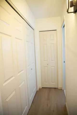 a bathroom with a glass shower door