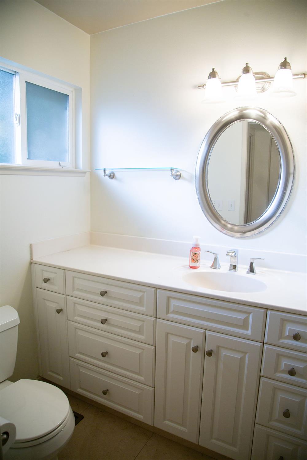 1208 Bristol Court Modesto, CA 95350 - Photo 27 of 40 Master bathroom featuring vanity and light tile patterned floors