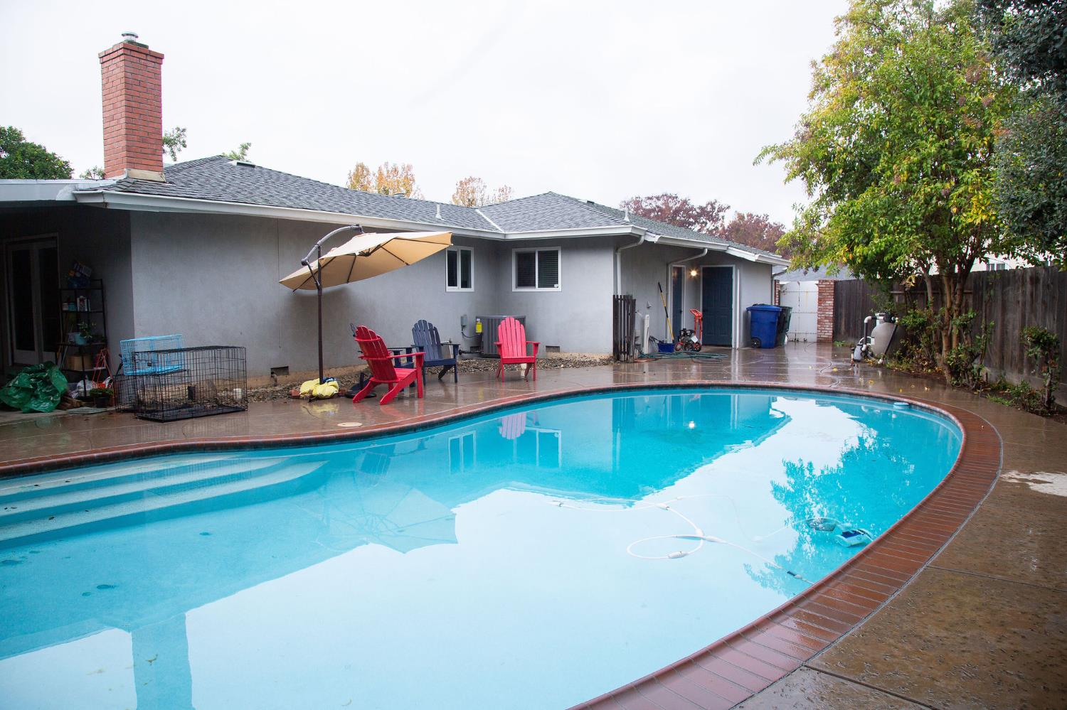 1208 Bristol Court Modesto, CA 95350 - Photo 4 of 40 view of swimming pool with a patio