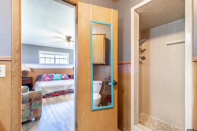 a view of an entryway with wooden floor