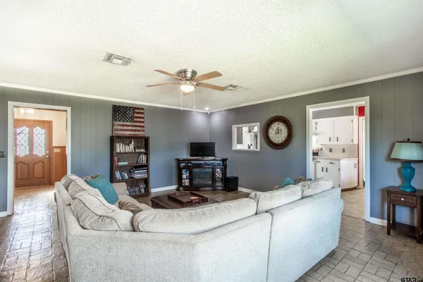 a living room with furniture and a table