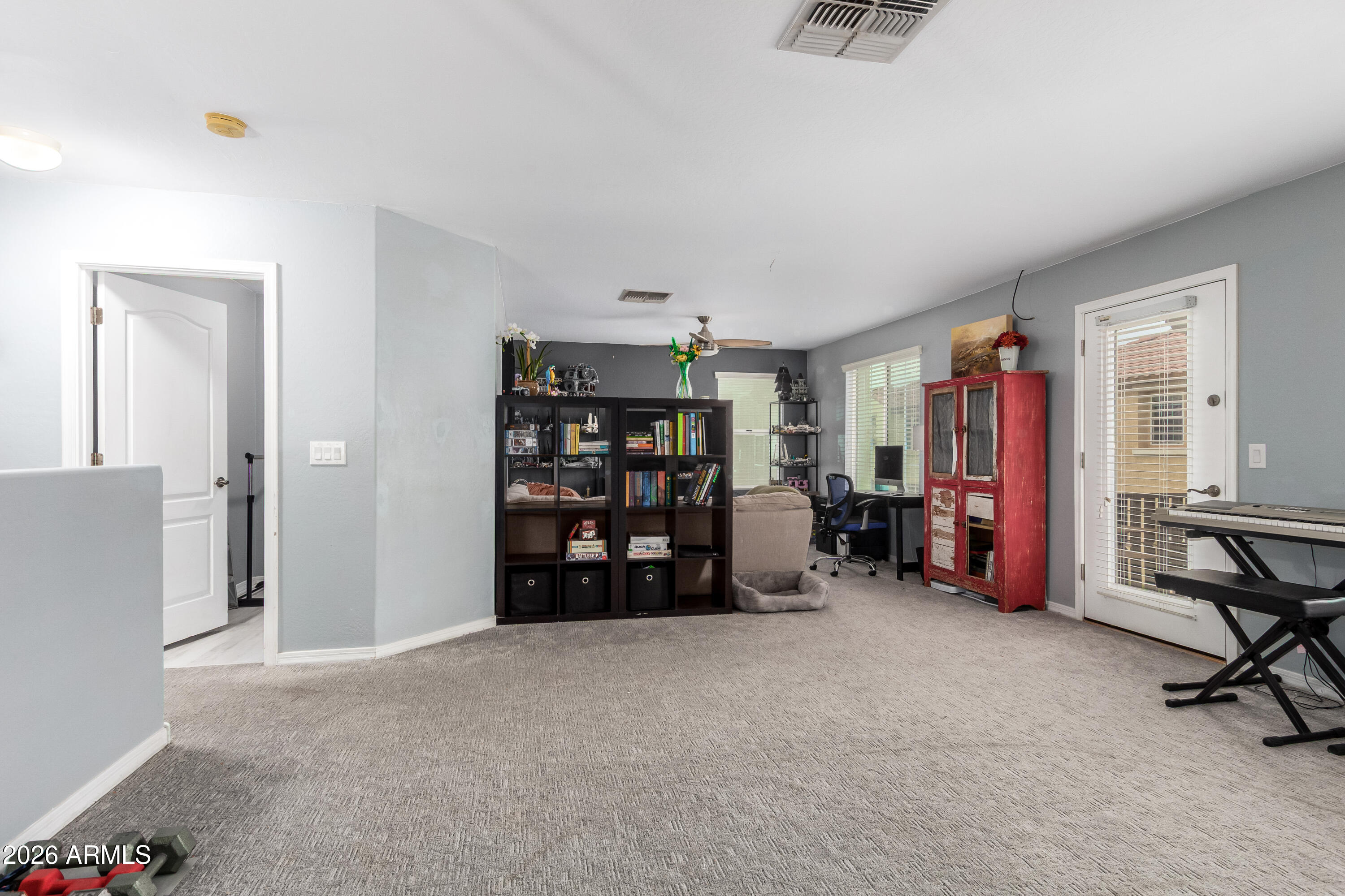 907 South Henry Lane Gilbert, AZ 85296 - Photo 21 of 25 a view of a bedroom with furniture and windows