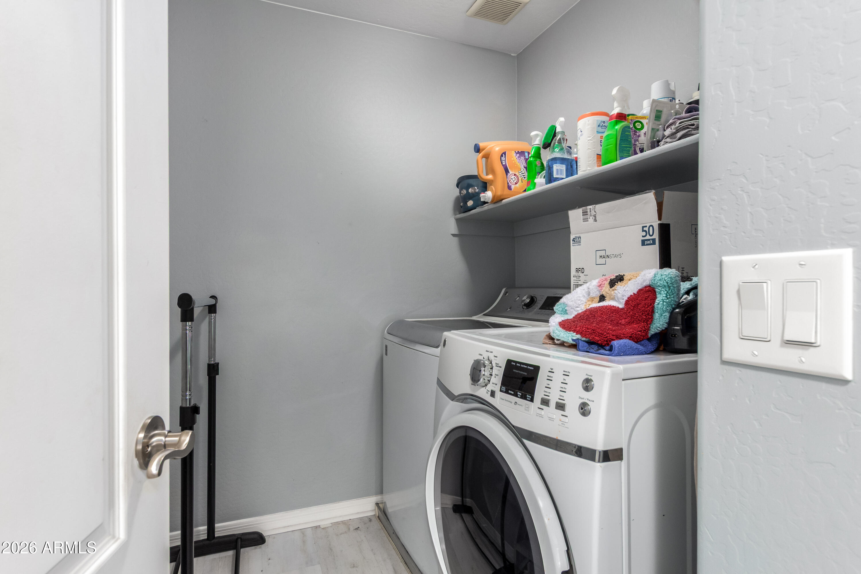 907 South Henry Lane Gilbert, AZ 85296 - Photo 23 of 25 a utility room with dryer and washer