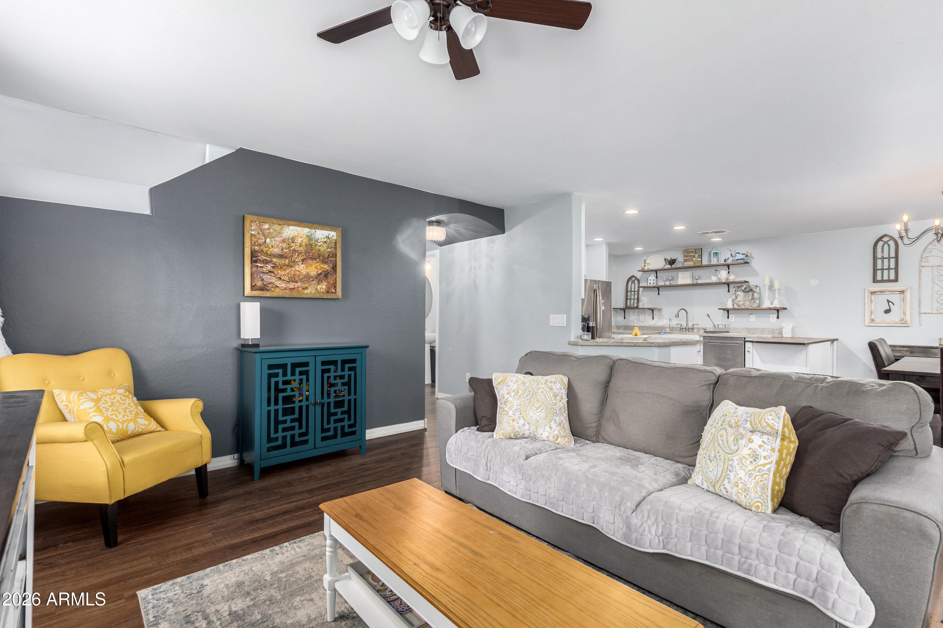 907 South Henry Lane Gilbert, AZ 85296 - Photo 6 of 25 a living room with furniture and a couch