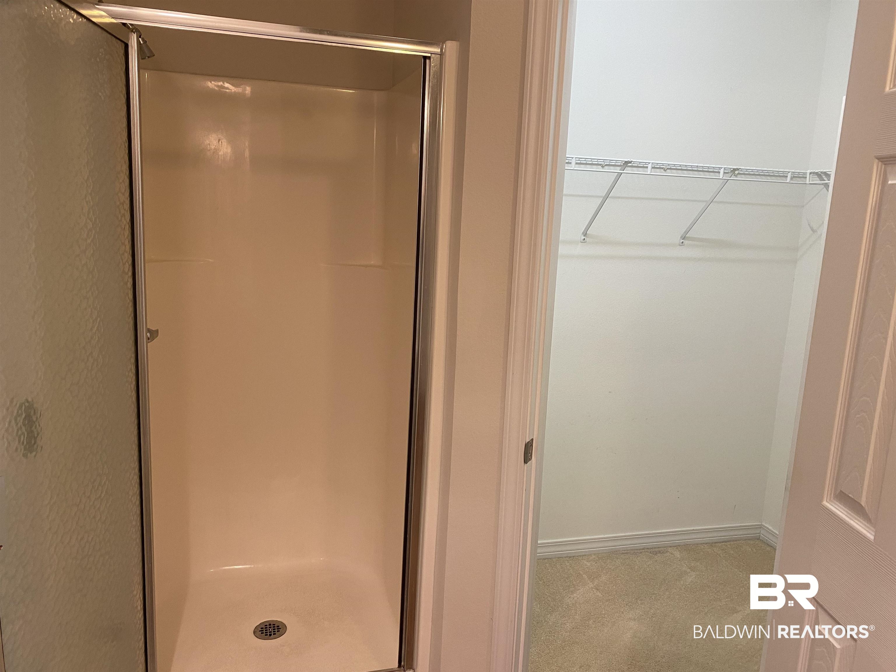 7742 Avery Lane Daphne, AL 36526 - Photo 20 of 41 Master Bath shower & walk in closet