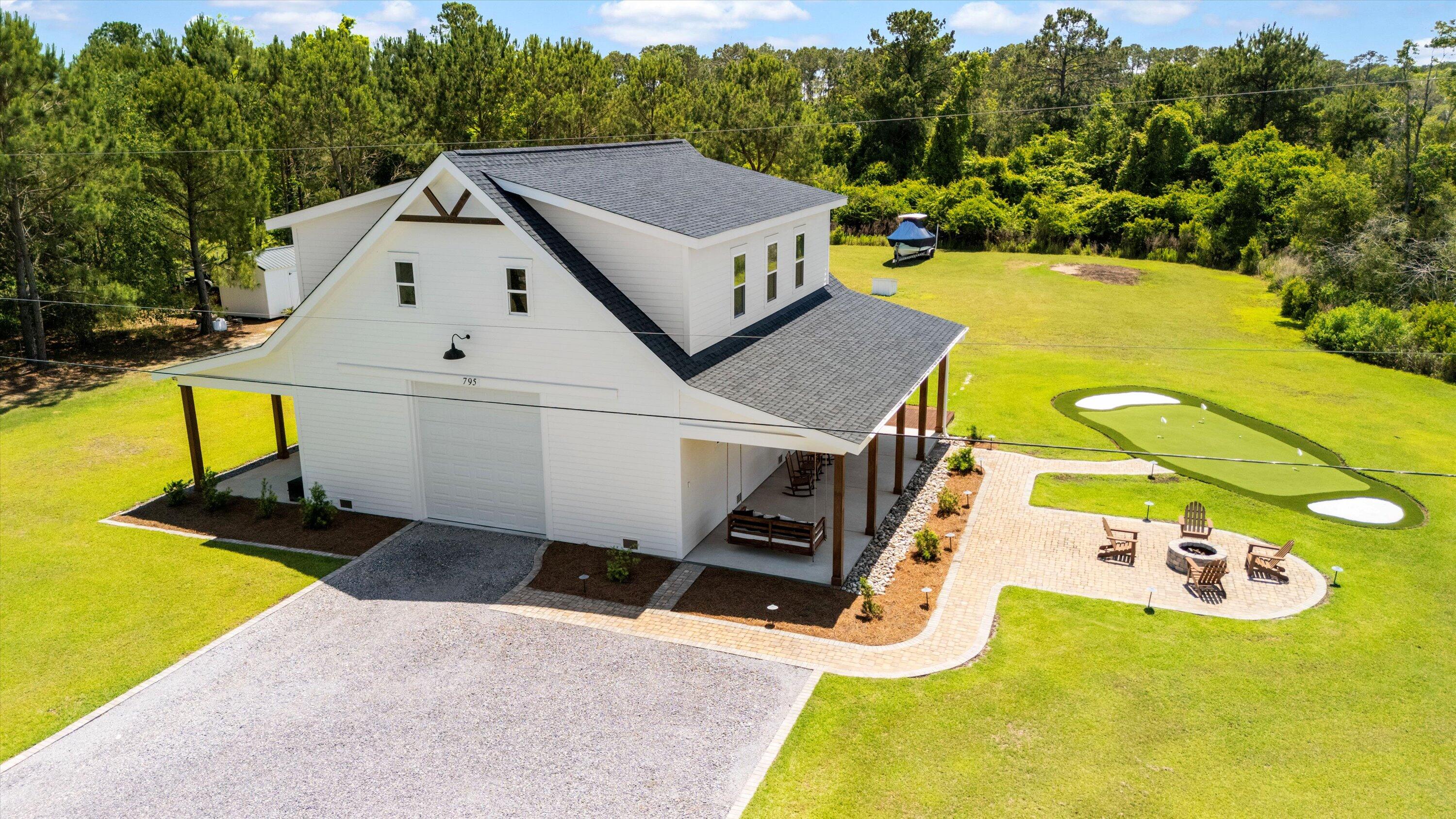 795 Shagule Road Edisto Island, SC 29438 - Photo 1 of 57 47-DJI_20250513143115_0018_D