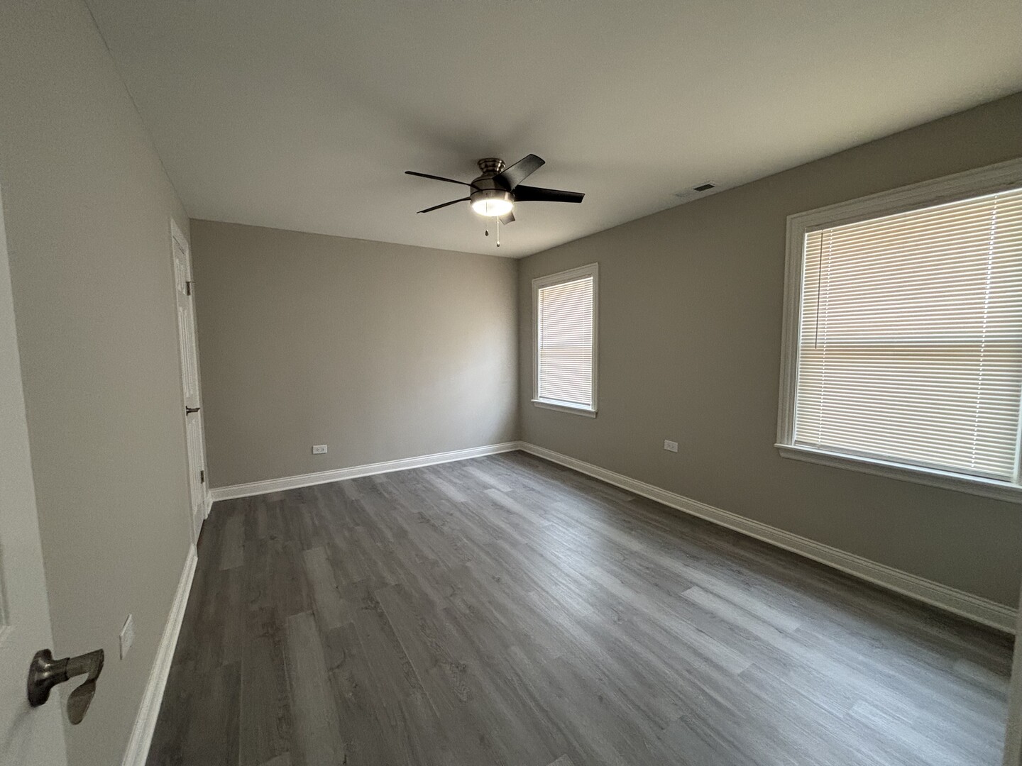 17092 Lincoln Street Hazel Crest, IL 60429 - Photo 13 of 20 wooden floor in an empty room with a window