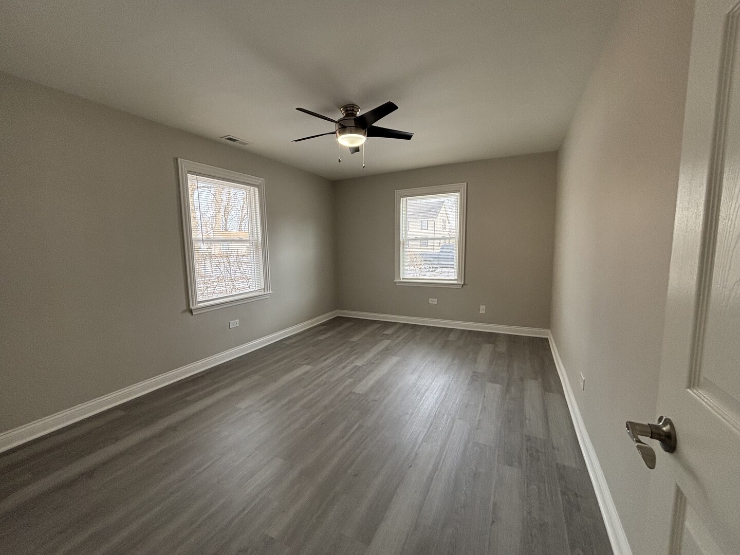 17092 Lincoln Street Hazel Crest, IL 60429 - Photo 16 of 20 wooden floor in an empty room with a window
