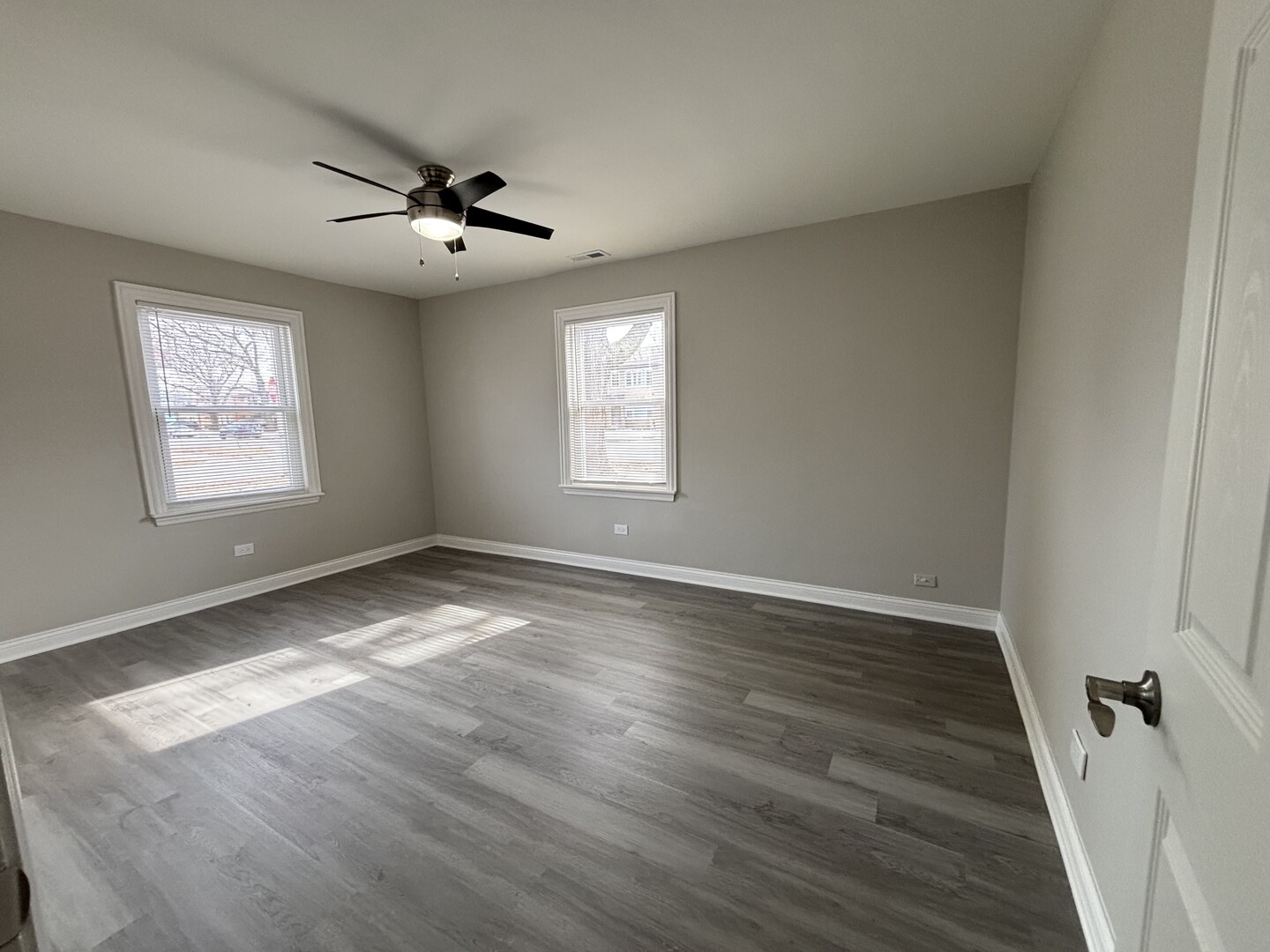 17092 Lincoln Street Hazel Crest, IL 60429 - Photo 17 of 20 wooden floor in an empty room with a window