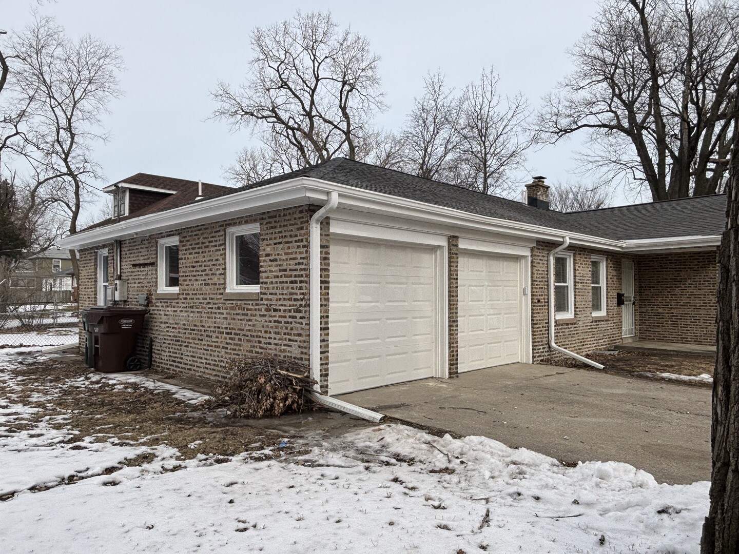 17092 Lincoln Street Hazel Crest, IL 60429 - Photo 2 of 20 a front view of a house with a yard