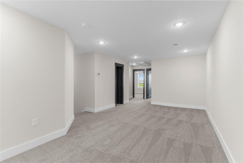 1650 Palladio Loop, Unit 2 Princeton, TX 75407 - Photo 5 of 14 Carpeted interior space with recessed lighting and neutral wall tones