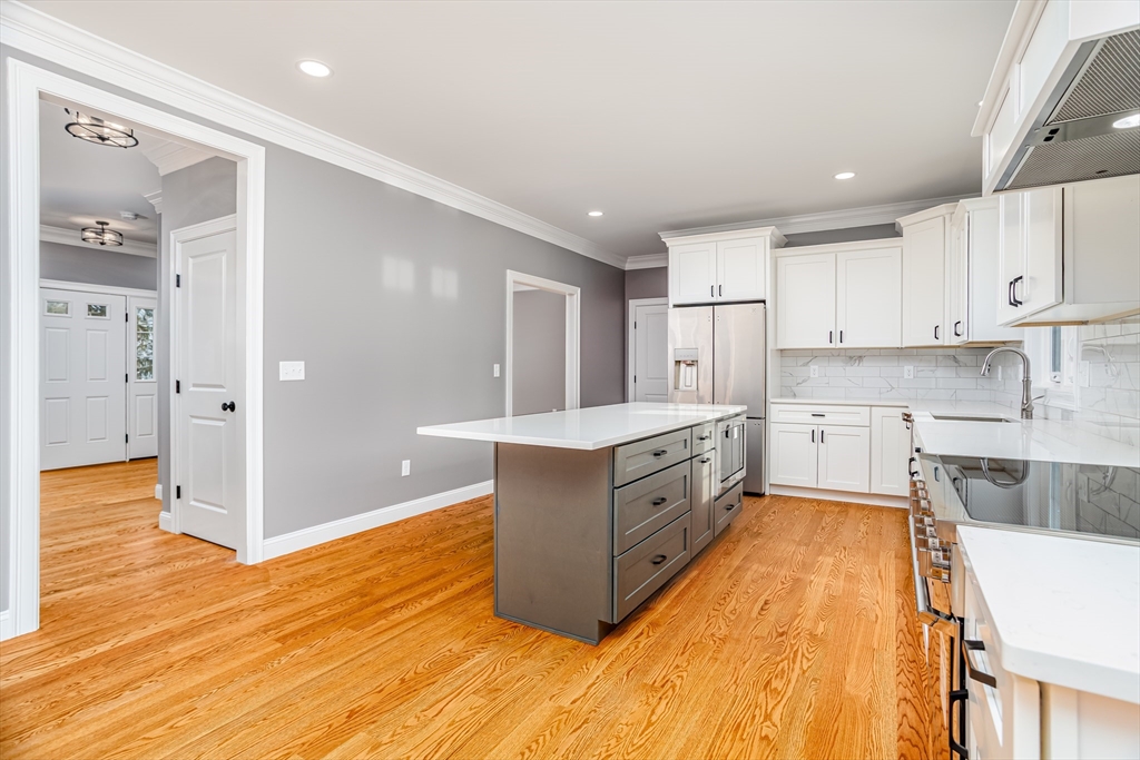 44 Nod Road Groton, MA 01450 - Photo 7 of 42 a large kitchen with stainless steel appliances granite countertop a stove a sink and a refrigerator