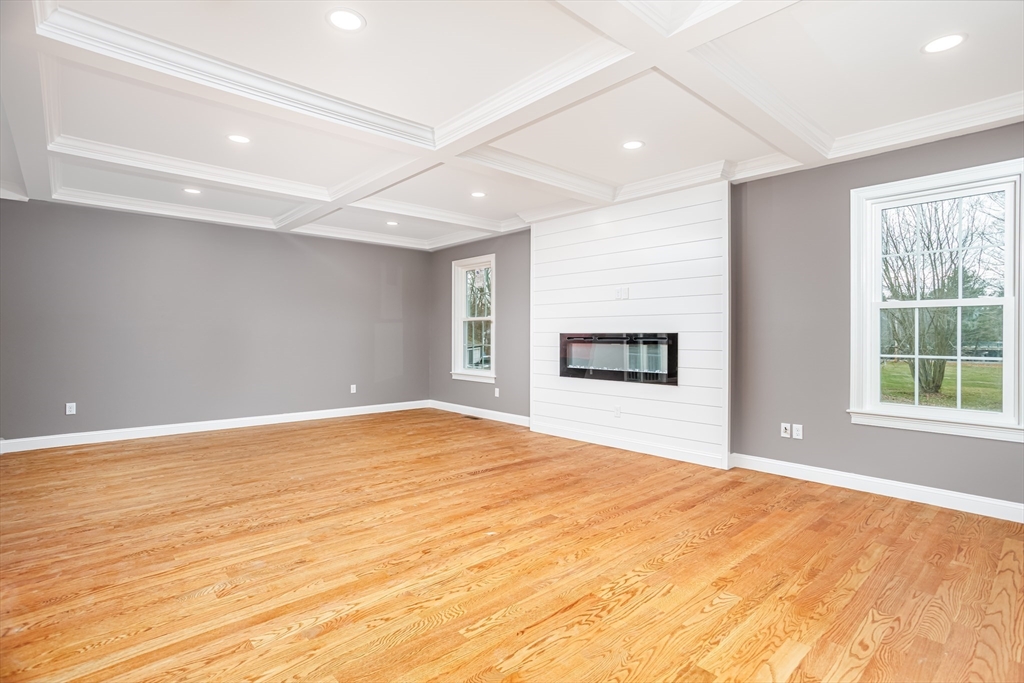 44 Nod Road Groton, MA 01450 - Photo 9 of 42 a view of an empty room with wooden floor and a window