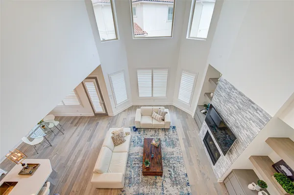 a view of living room with wooden floor