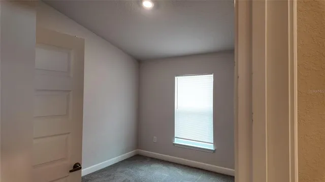 an empty room with closet