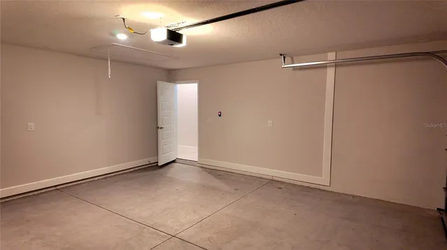 a front view of a house with garage