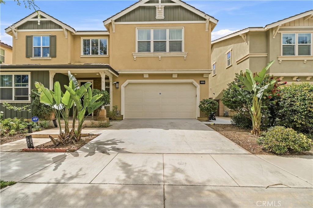 3380 Pine Ridge Loop Ontario, CA 91761 - Photo 35 of 37 a front view of a house with garden